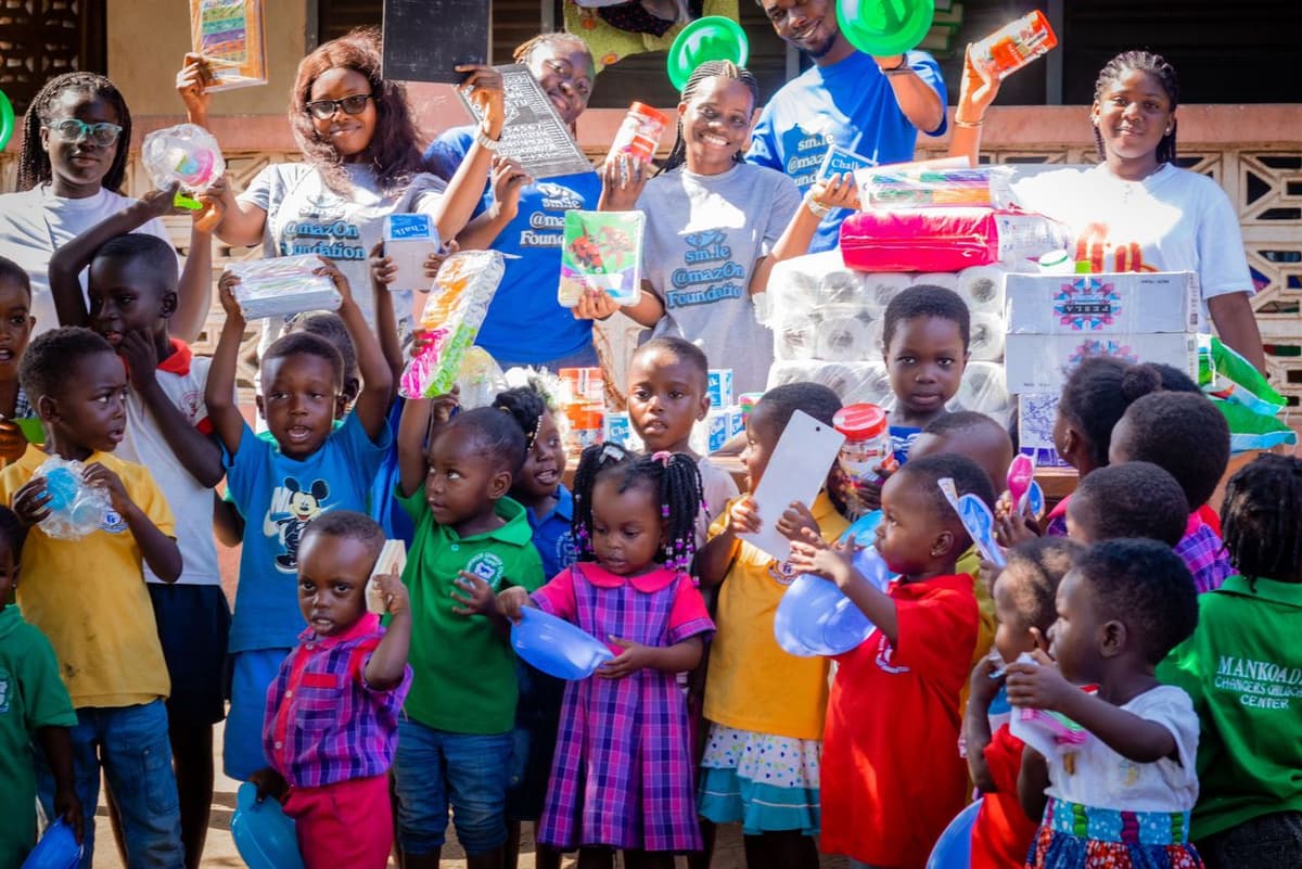 Happy children receiving donations